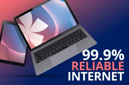 A laptop and tablet floating over a blue and pink background with text: 99.9% Reliable Internet.